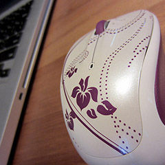 A close up of a wireless mouse